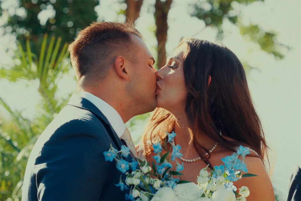 Bride and groom during their wedding. Shot by Jose from Tideus Media. A San Diego Wedding Videographer